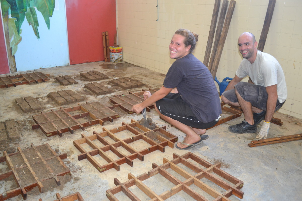 Daniel Murgel. Photos in the atelier/studio during the process of the fabrication of the adobe bricks for the site specific piece <I>Como fazer as paredes da minha casa</I> [How to Make the Walls of My House]. Artistic residency on the occasion of the exhibition Play curated by Marta Mestre and Fernanda Pequeno, mBrac, 2013.