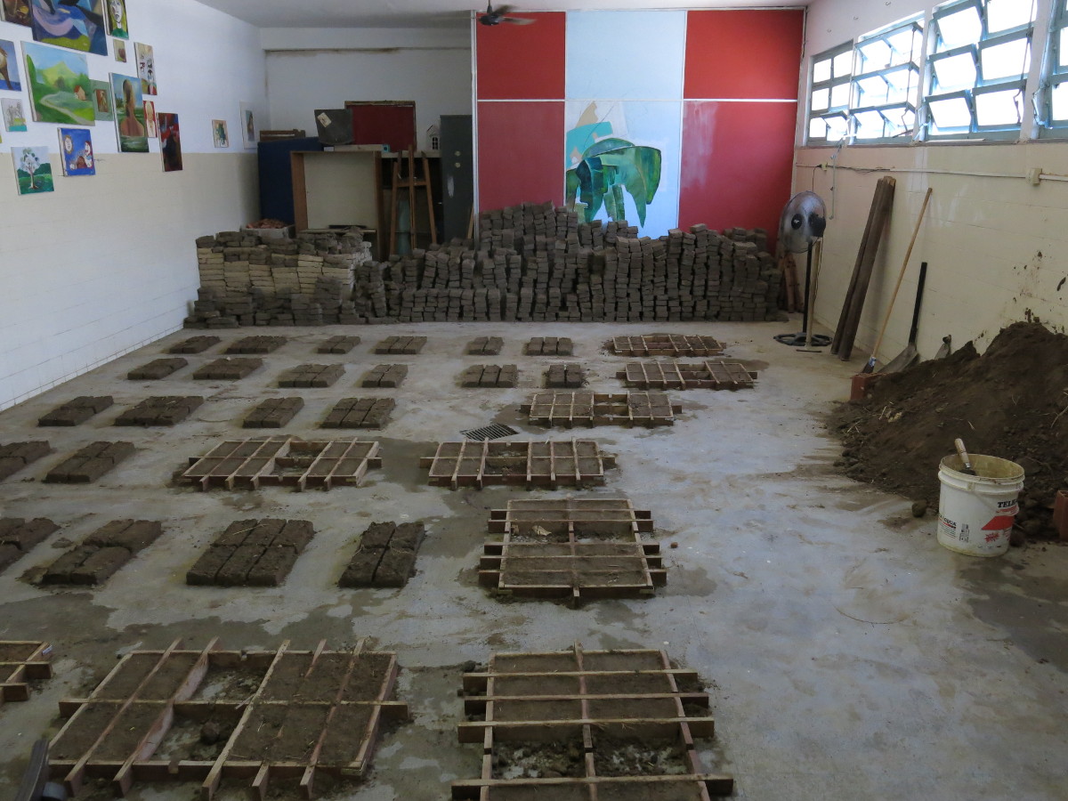 Daniel Murgel. Photos in the atelier/studio during the process of the fabrication of the adobe bricks for the site specific piece <I>Como fazer as paredes da minha casa</I> [How to Make the Walls of My House]. Artistic residency on the occasion of the exhibition Play curated by Marta Mestre and Fernanda Pequeno, mBrac, 2013.